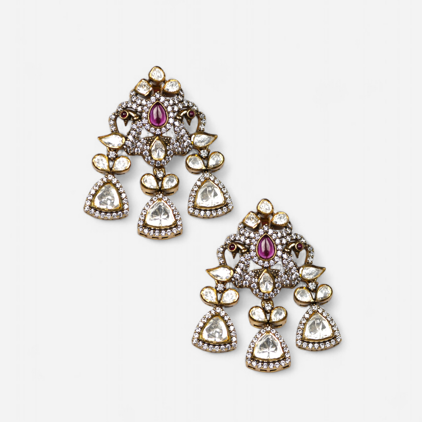 Mor Maharani gold-plated statement earrings by Arka Jaipur featuring moissanite stones, intricate peacock-inspired design, and traditional Indian craftsmanship – perfect for weddings and festive occasions.