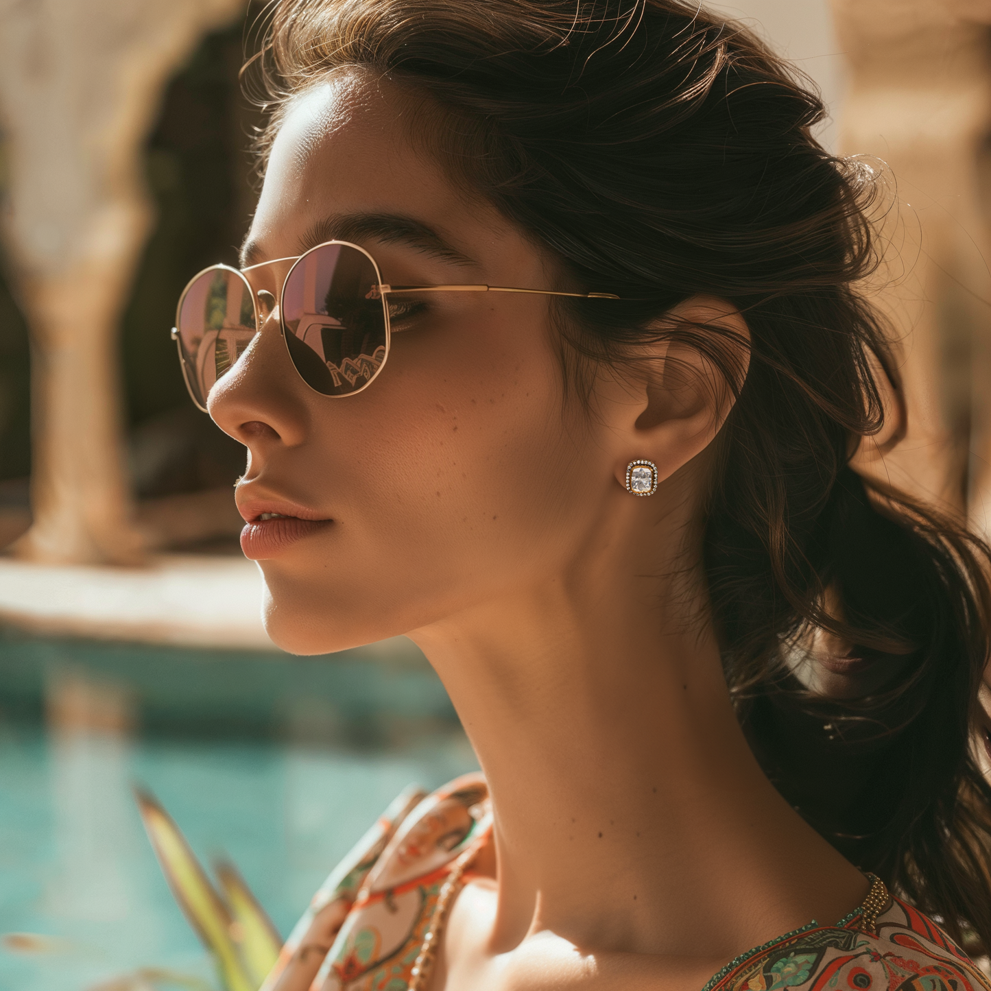 Gleaming Elegance studs by Arka Jaipur – cushion-cut moissanite stud earrings in silver with pavé halo detailing.