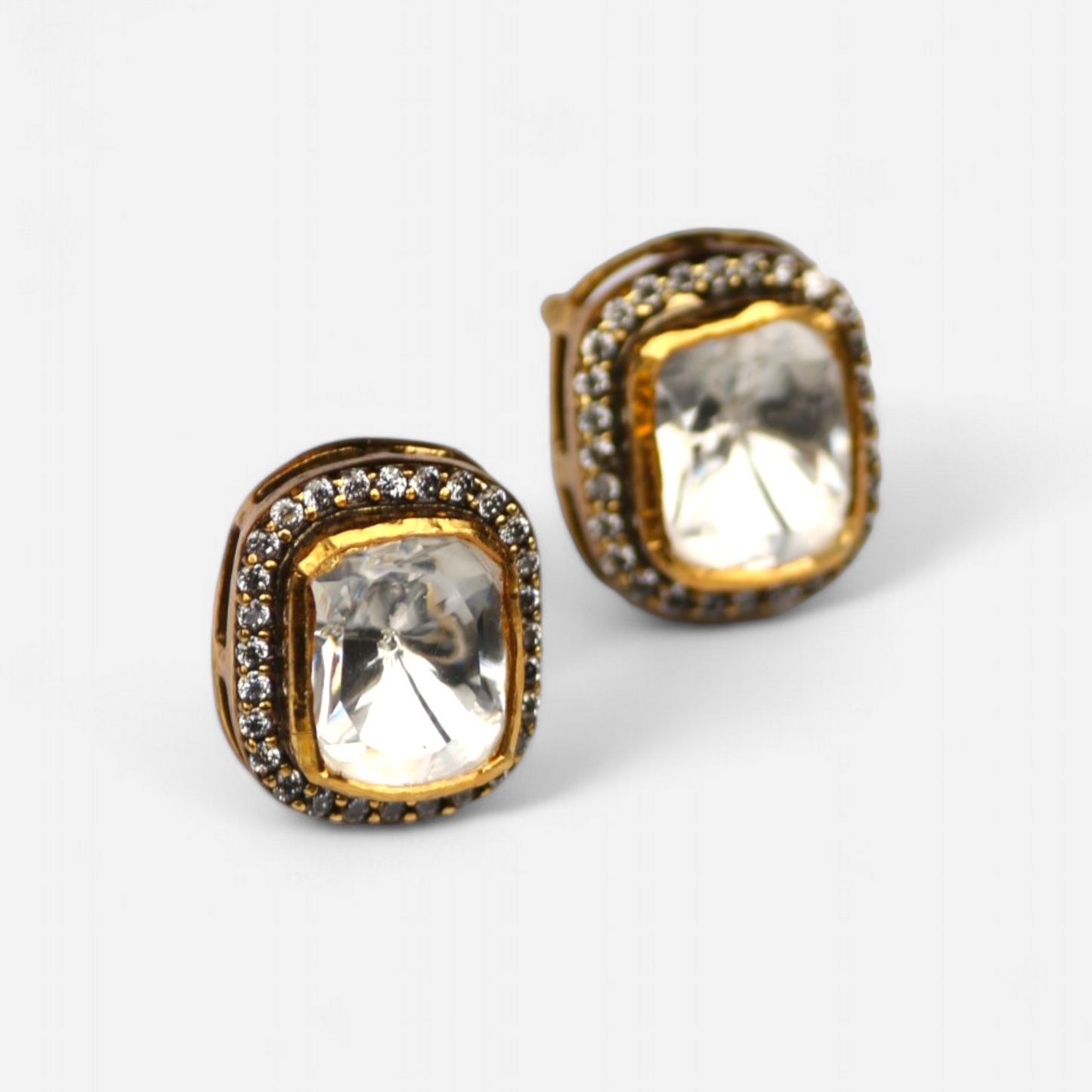 Gleaming Elegance studs by Arka Jaipur – cushion-cut moissanite stud earrings in silver with pavé halo detailing.