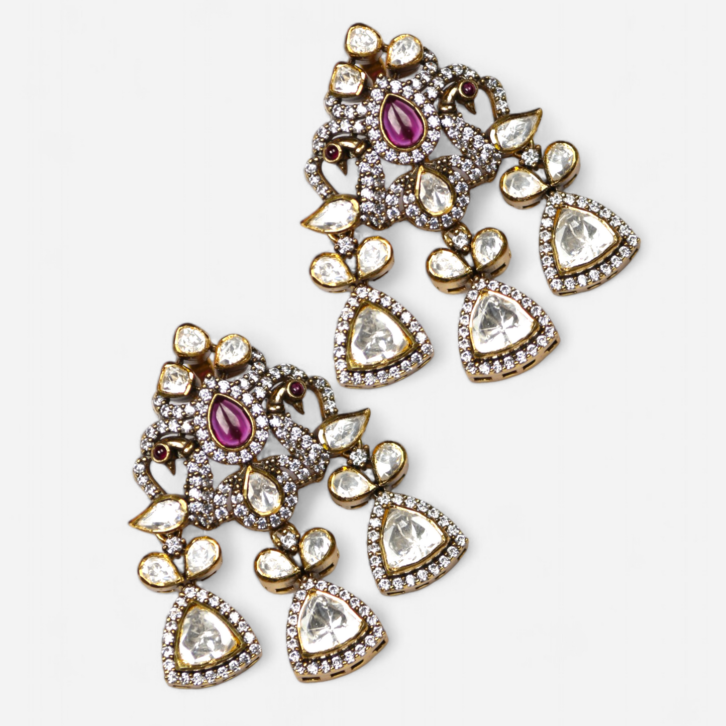 Mor Maharani gold-plated statement earrings by Arka Jaipur featuring moissanite stones, intricate peacock-inspired design, and traditional Indian craftsmanship – perfect for weddings and festive occasions.