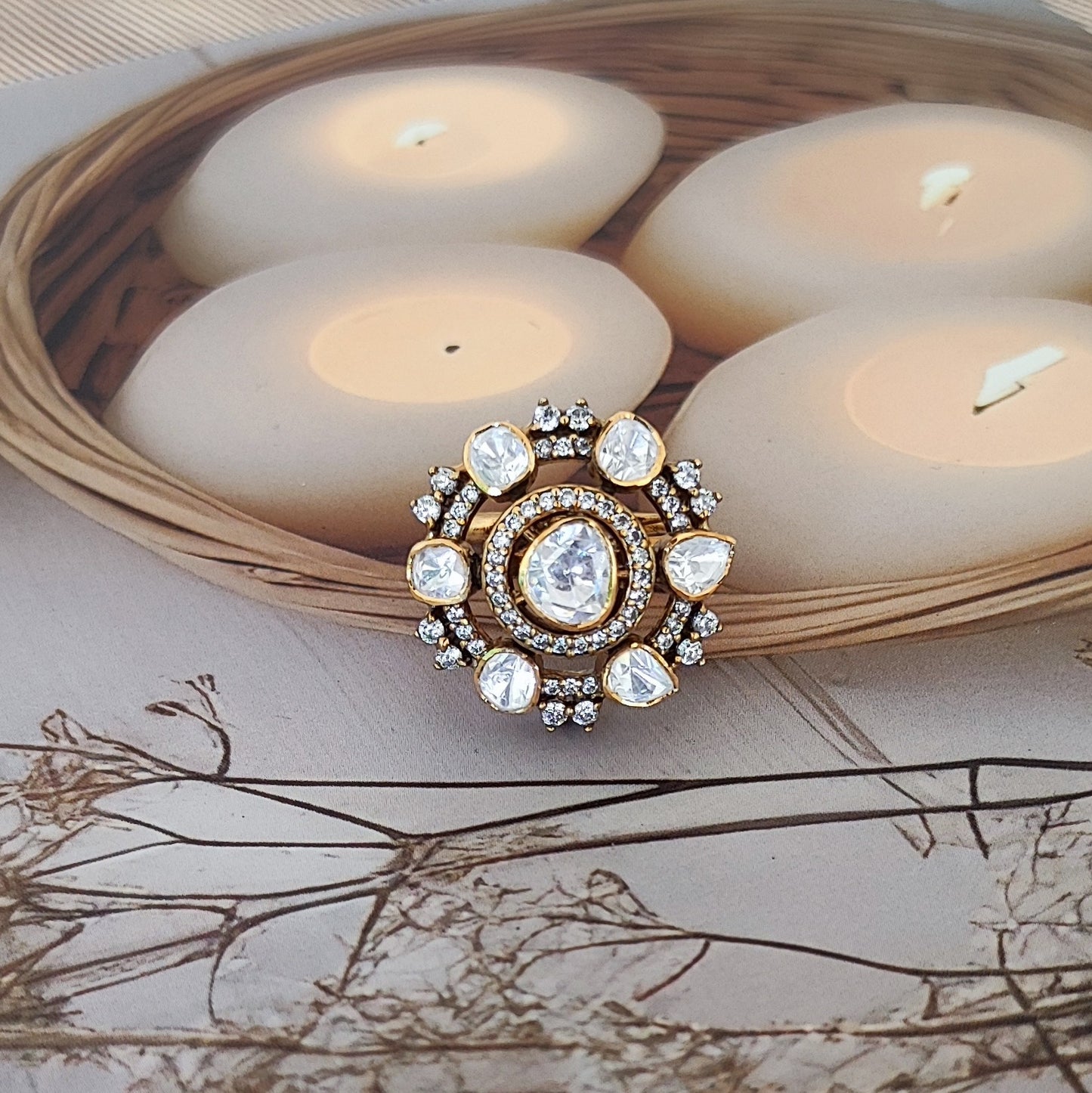 “Eternal Blossom Ring by Arka Jaipur featuring uncut Polki stones, teardrop centre, crystal halo, and gold-tone floral design"