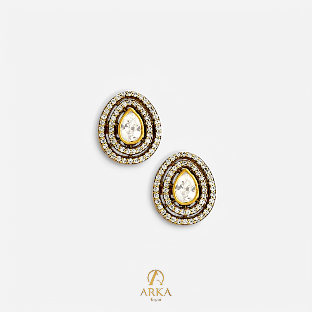 Ethereal Drop Studs by Arka Jaipur – triple halo teardrop moissanite earrings in gold-plated silver.