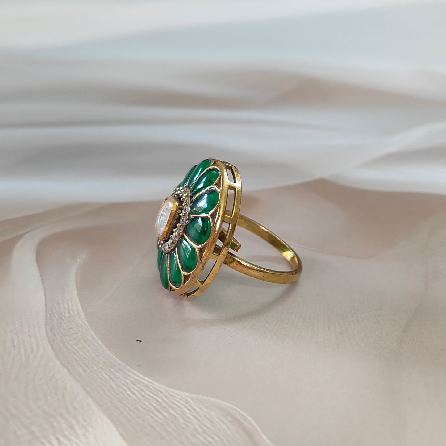 Green enamel floral Gulnar Ring with Polki center stone and crystal halo, set in gold-tone finish in 925 sterling silver, handcrafted traditional design by Arka Jaipur.