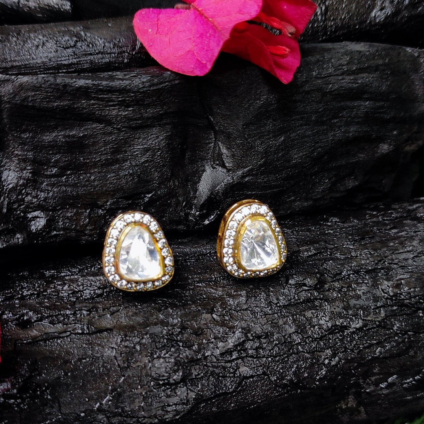 Twilight Triad studs by Arka Jaipur – asymmetrical triangle moissanite studs in silver with pavé halo setting.
