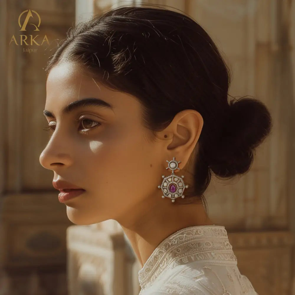 Model_wearing_Chandrima_Chakori_earrings_by_Arka_Jaipur_intricately_handcrafted_silver_earrings_with_moissanite_and_a_central_amethyst_stone