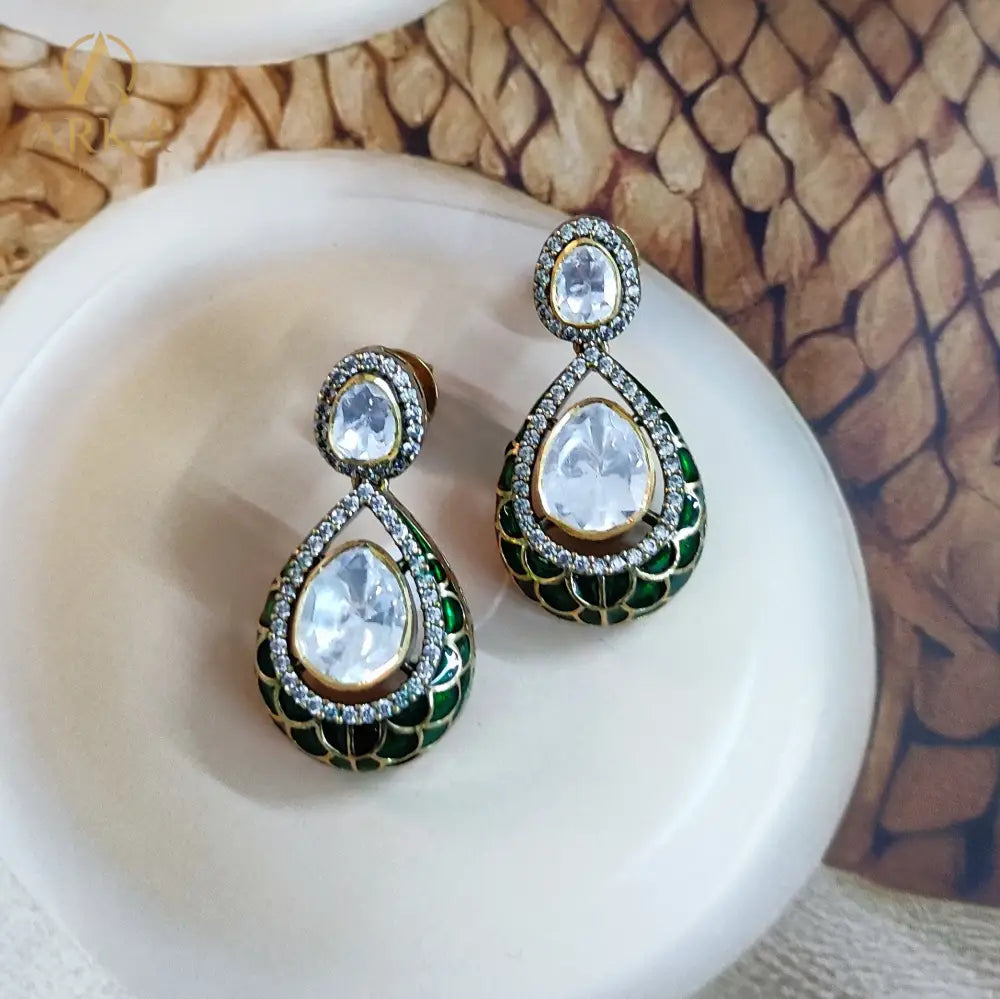 "Emerald Embrace Earrings by Arka Jaipur – teardrop kundan earrings with green enamel, diamond accents, and timeless Indian jewelry design"