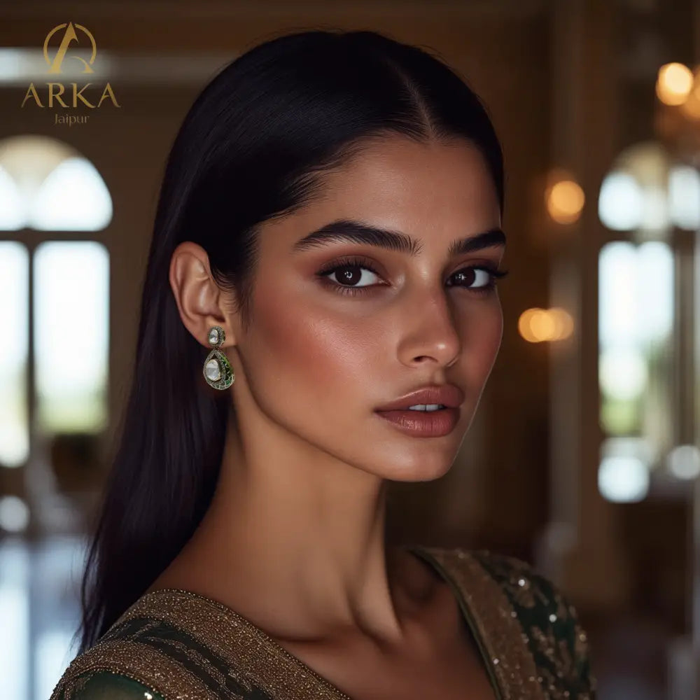 "Emerald Embrace Earrings by Arka Jaipur – teardrop kundan earrings with green enamel, diamond accents, and timeless Indian jewelry design"