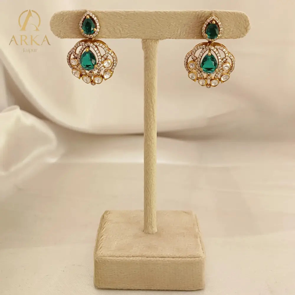 Arka Jaipur emerald green kundan polki necklace set with matching earrings in sterling silver”
“Designer Indian bridal jewelry set with emerald stones and polki kundan work by Arka Jaipur”
“Luxury sterling silver necklace and earrings with emerald green accents and kundan detailing”
“Traditional Indian bridal emerald kundan polki jewelry set by Arka Jaipur”