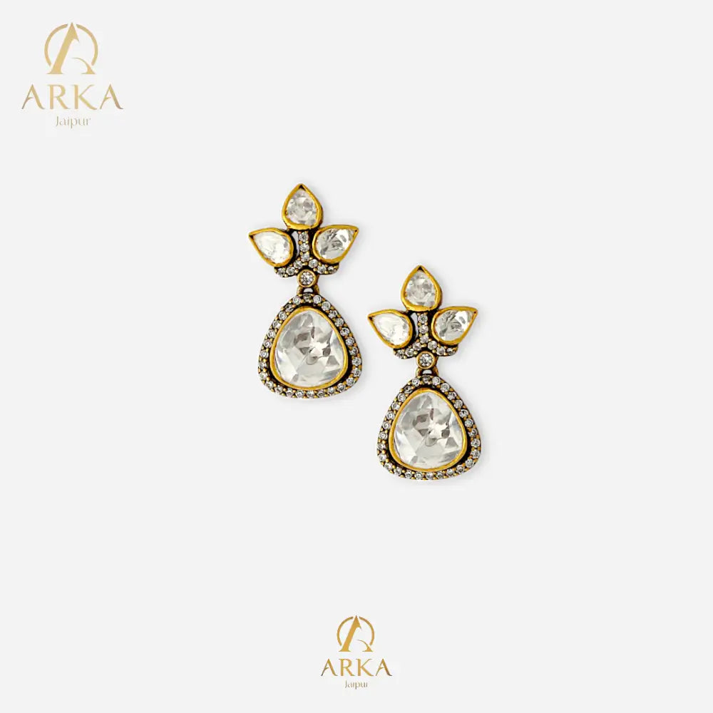 "Lotus Dewdrop Earrings by Arka Jaipur featuring uncut polki-style stones in lotus petal and teardrop shapes, antique gold finish with crystal accents, handcrafted Indian designer jewelry"