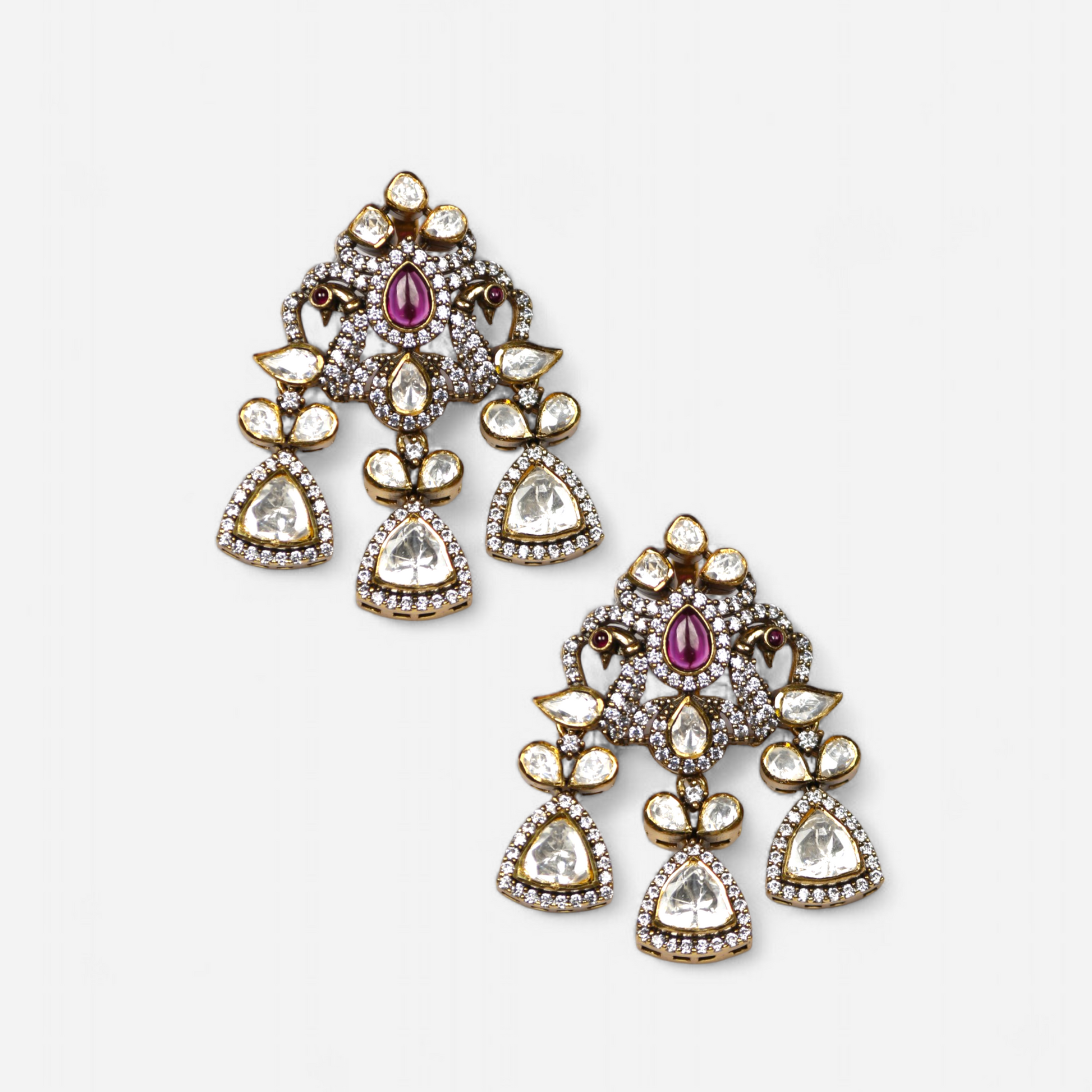 Mor Maharani gold-plated statement earrings by Arka Jaipur featuring moissanite stones, intricate peacock-inspired design, and traditional Indian craftsmanship – perfect for weddings and festive occasions.