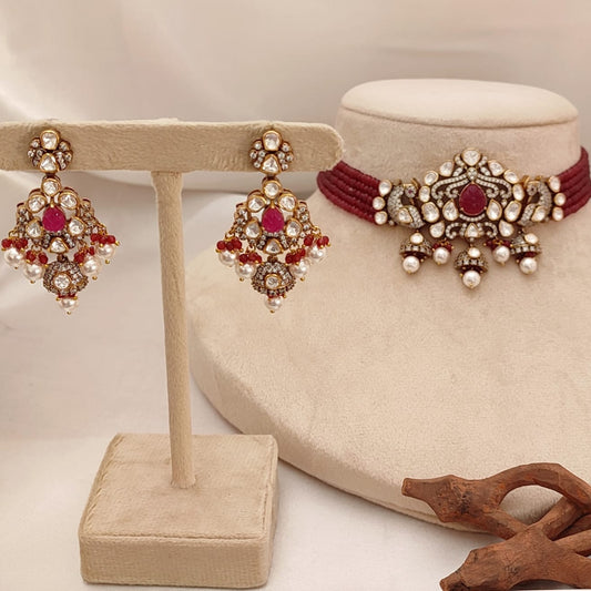 Crimson Vogue Set by Arka Jaipur featuring ruby kundan drop earrings and a maroon thread choker with pearl and stone embellishments, styled for pre-wedding celebrations.
