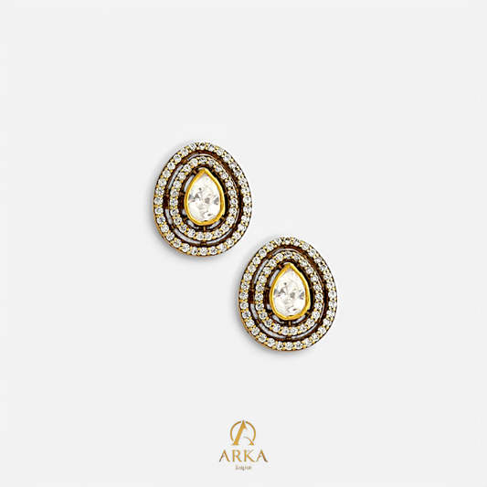 Ethereal Drop Studs by Arka Jaipur – triple halo teardrop moissanite earrings in gold-plated silver.