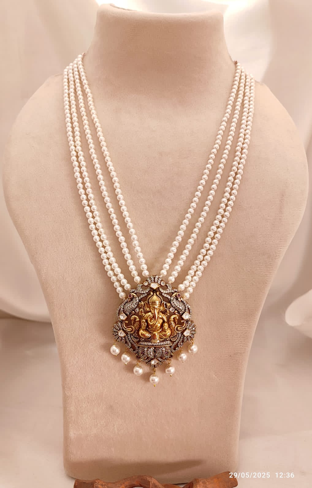 Iraj pearl necklace with Lord Ganesha pendant, multi-strand pearl necklace in antique gold tone, traditional temple jewellery for weddings and festive occasions