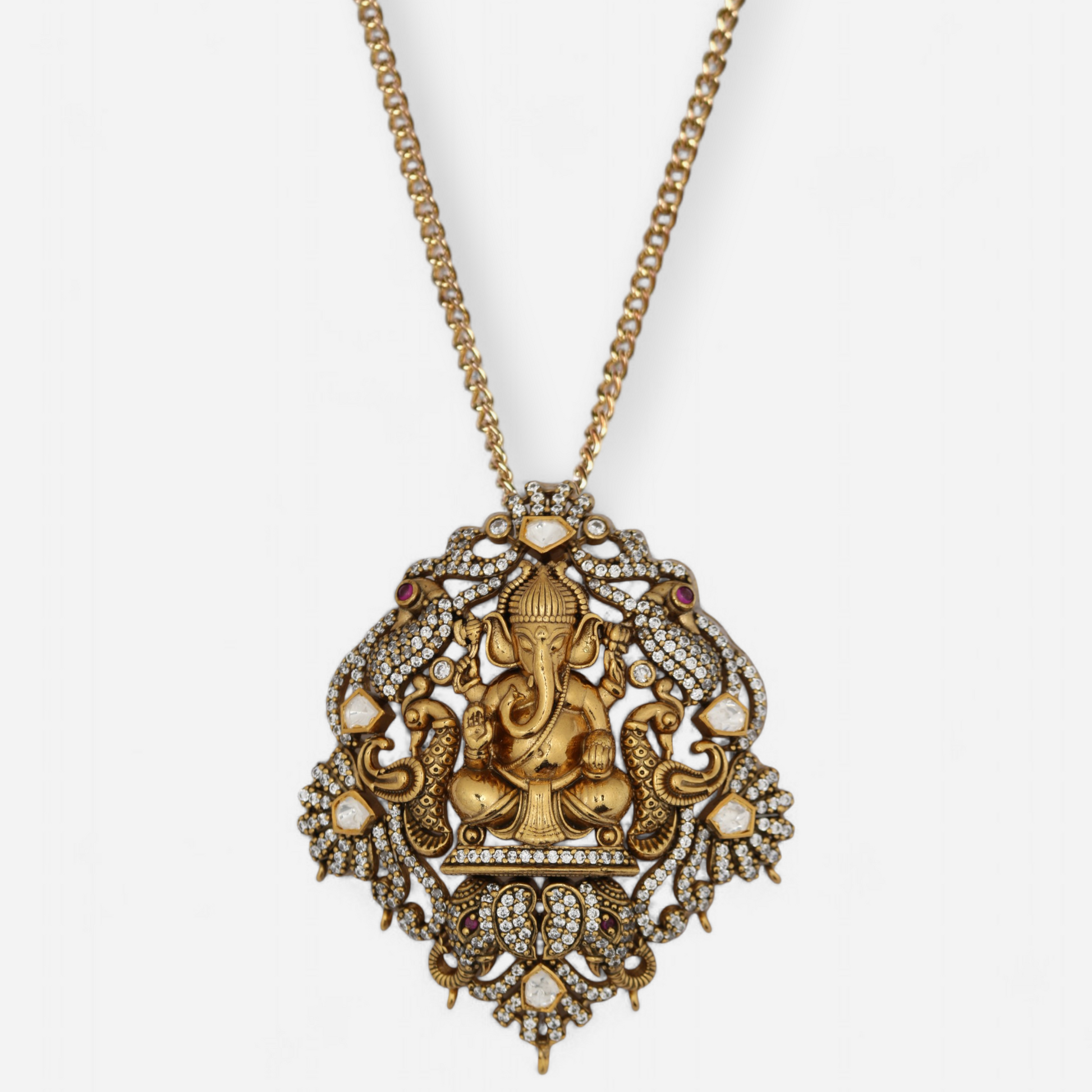 Gold-plated silver pendant featuring Lord Ganesha idol, studded with moissanite and kundan stones, designed by Arka Jaipur.
