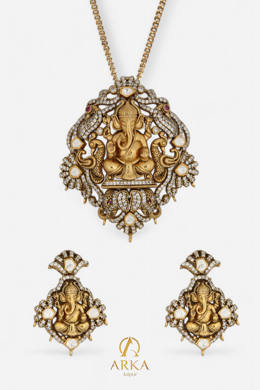 Gold-plated silver pendant set with Lord Ganesha motif, including matching earrings, intricately designed with moissanite and kundan stones by Arka Jaipur.