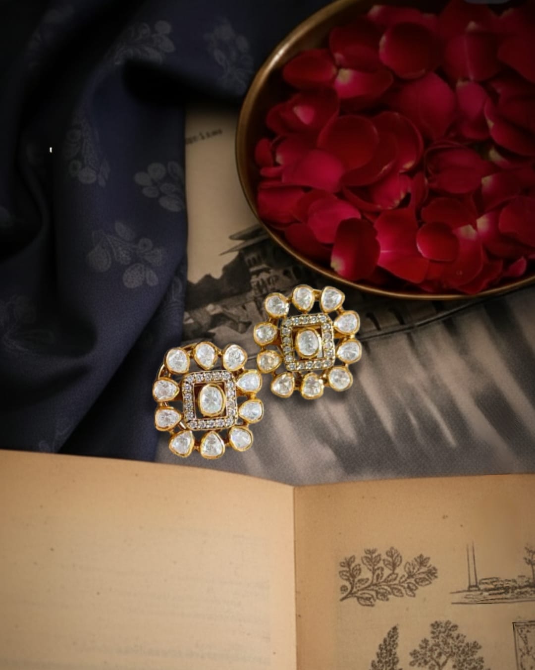 Ivory Halo Studs with square polki center and halo design in a creative flatlay