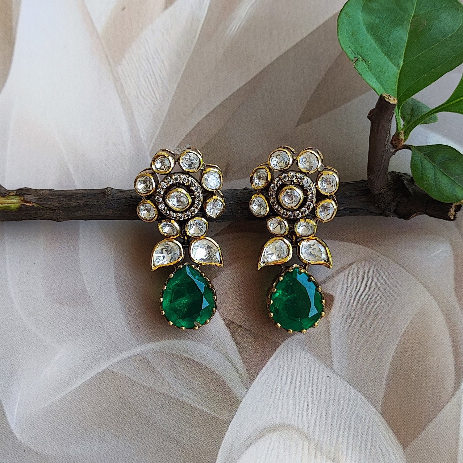 "Arka Jaipurs, Ivy Drop gold-plated kundan floral earrings with polki stones and emerald green teardrop, traditional Indian jewelry for weddings and festive occasions"