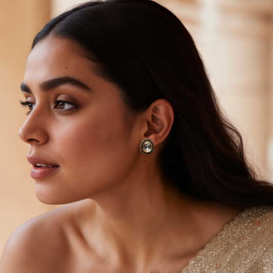Lunar Embrace earrings by Arka Jaipur – teardrop moissanite earrings with pavé halo in sterling silver.