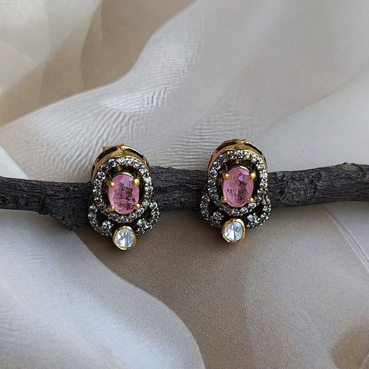 "Gold-plated Roséra earrings with pink oval gemstone and crystal halo by Arka Jaipur"