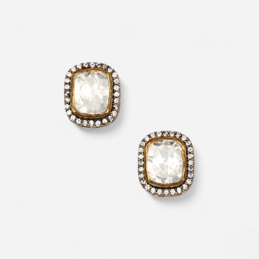 Gleaming Elegance studs by Arka Jaipur – cushion-cut moissanite stud earrings in silver with pavé halo detailing.