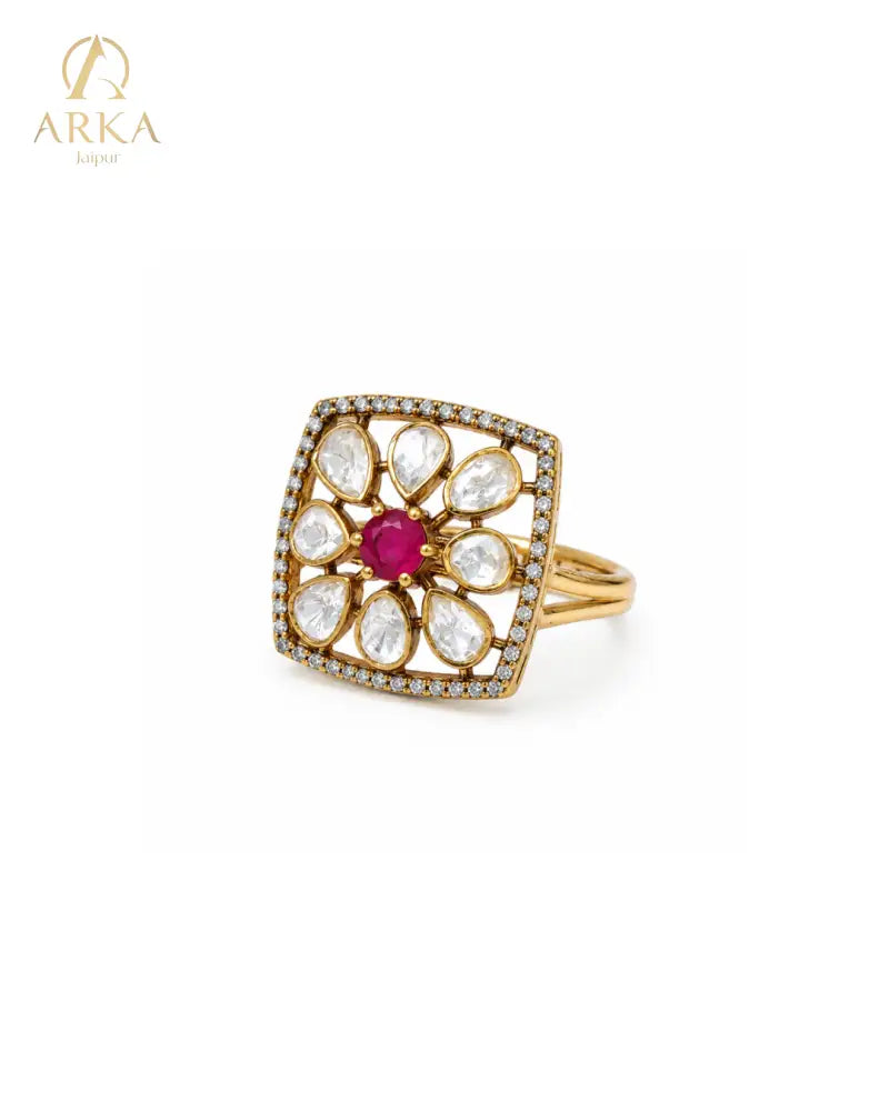 Floral statement ring with ruby pink center stone and moissanite polki stones by Arka Jaipur