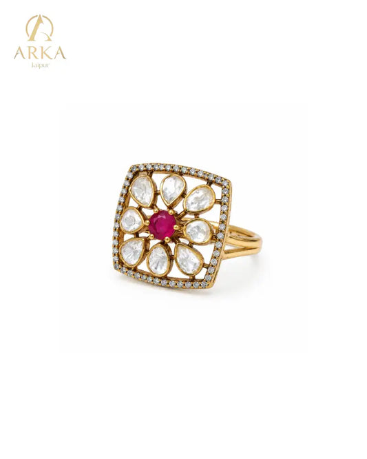 Floral statement ring with ruby pink center stone and moissanite polki stones by Arka Jaipur