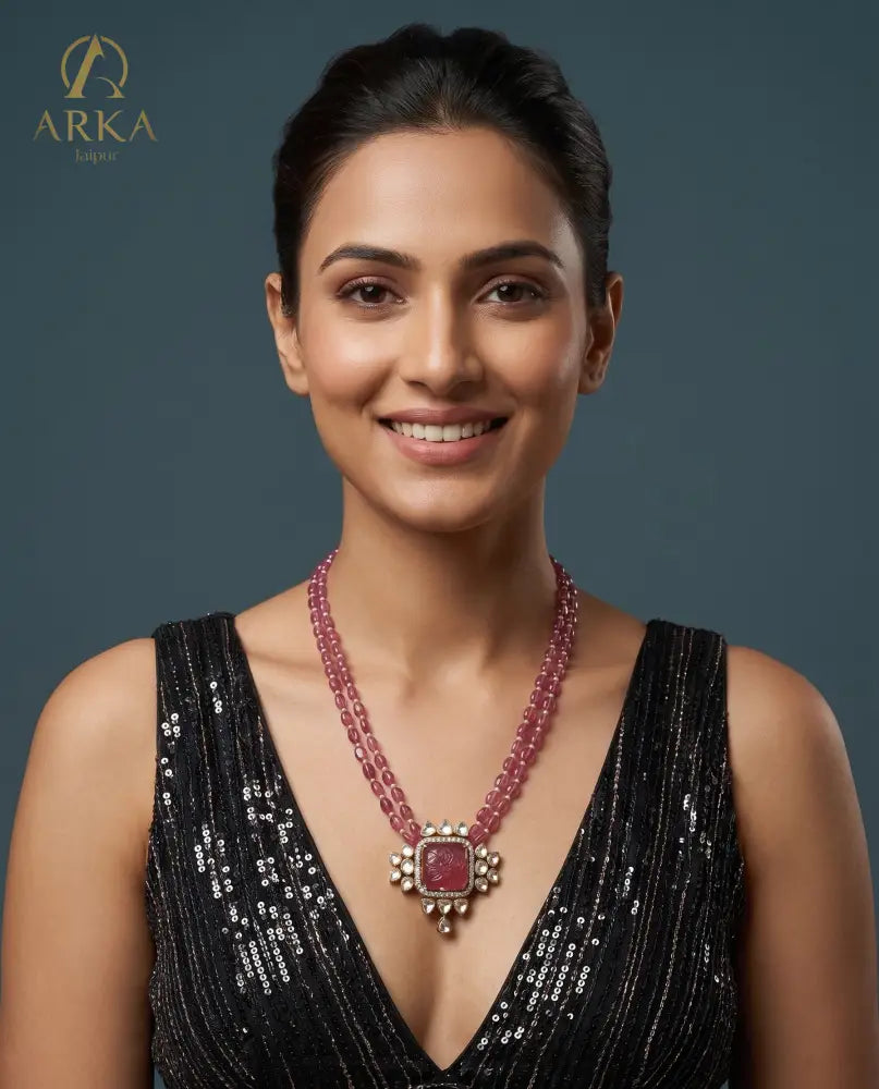 Carved Aura Red Ruby Necklace with Floral Engraved Stone and Two-Tier Bead Chain by Arka Jaipur