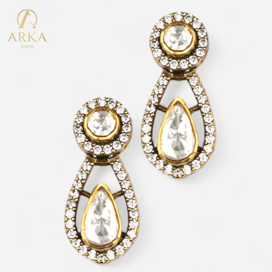 Elevate_your_elegance_with_Arka_Jaipur_s_Dewdrop_Earrings_crafted_in_925_sterling_silver_and_adorned_with_sparkling_moissanite_stones._Perfect_for_weddings_parties_or_festive_occasion