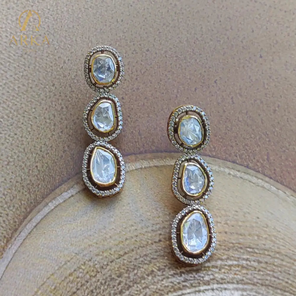"Heritage inspired Kundan polki drop earrings with uncut stones and CZ halo by Arka Jaipur – handcrafted gold-plated statement jewelry for weddings and festive wear"