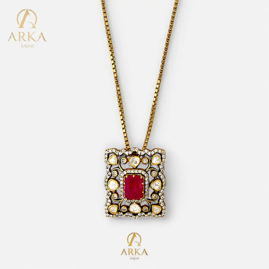 Royal Rosette Pendant by Arka Jaipur featuring a gold chain with a rectangular design, central red gemstone, and surrounding polki-style accents.